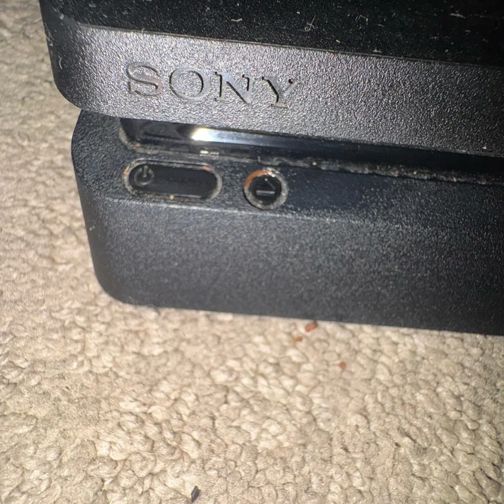 Ps4 with controller (including power cord and chargers) and 3 games